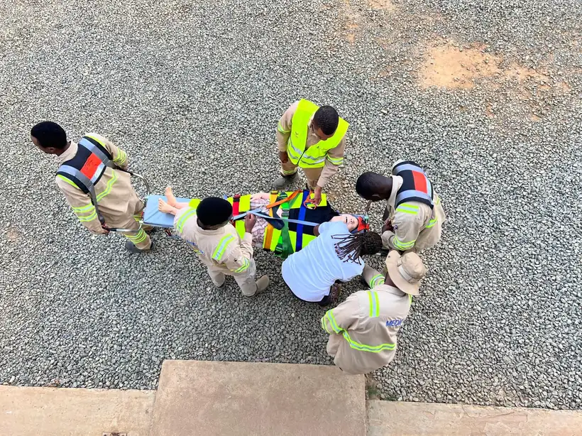 Rescue team performing a casualty extraction drill on a stretcher